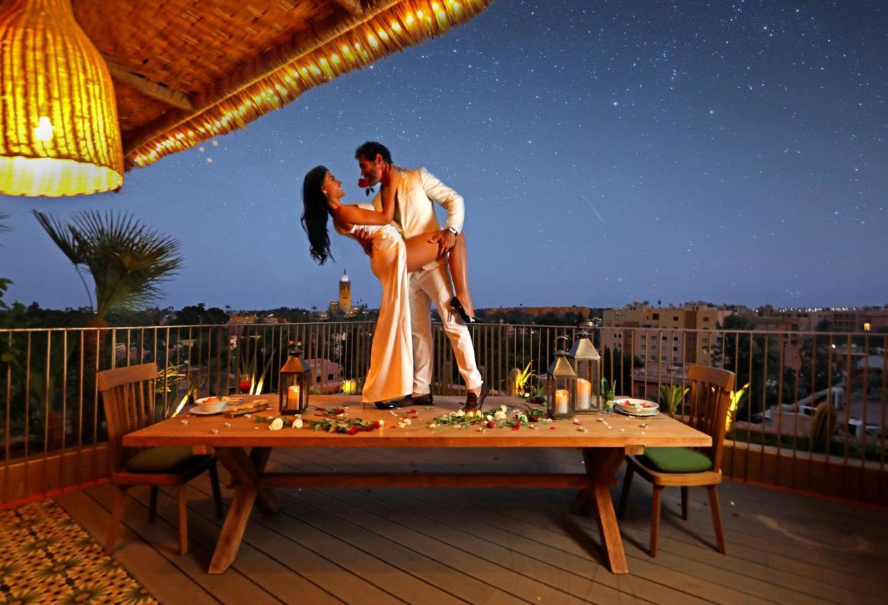 Hotel Jadali & Spa 马拉喀什 外观 照片 A couple dancing on a rooftop
